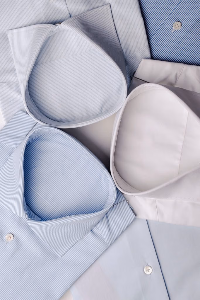 Folded light blue dress shirts